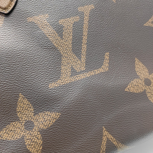 ONTHEGO MM Monogram Coated Canvas Brown