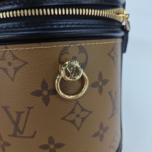 CANNES PM Monogram Coated Canvas Brown