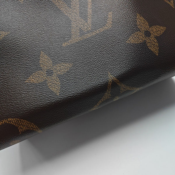 ONTHEGO MM Monogram Coated Canvas Brown