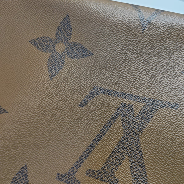 ONTHEGO MM Monogram Coated Canvas Brown