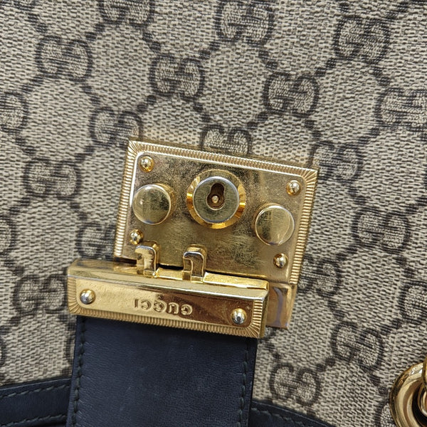 Padlock Small Monogram Coated Canvas Beige