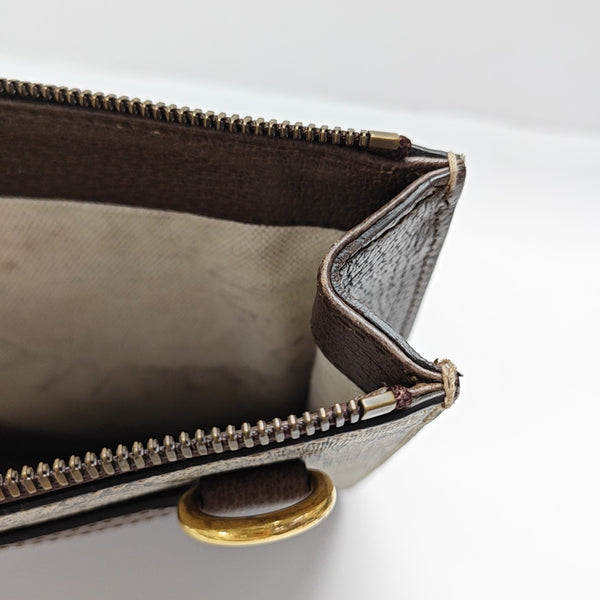 Monogram Coated Canvas Clutch Beige