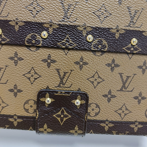 PETITE MALLE Monogram Coated Canvas Brown