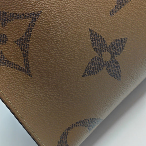 ONTHEGO MM Monogram Coated Canvas Brown