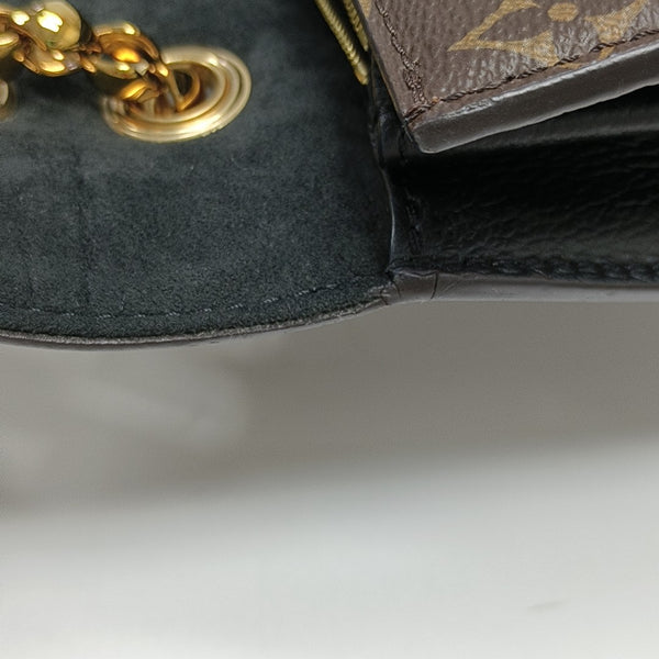 VICTOIRE Monogram Coated Canvas Brown