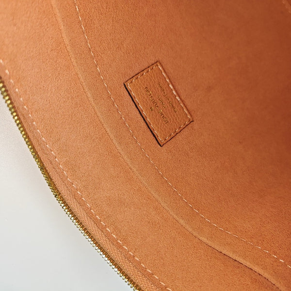 DAILY Monogram Coated Canvas Brown