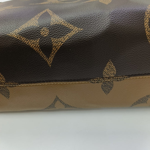 ONTHEGO MM Monogram Coated Canvas Brown