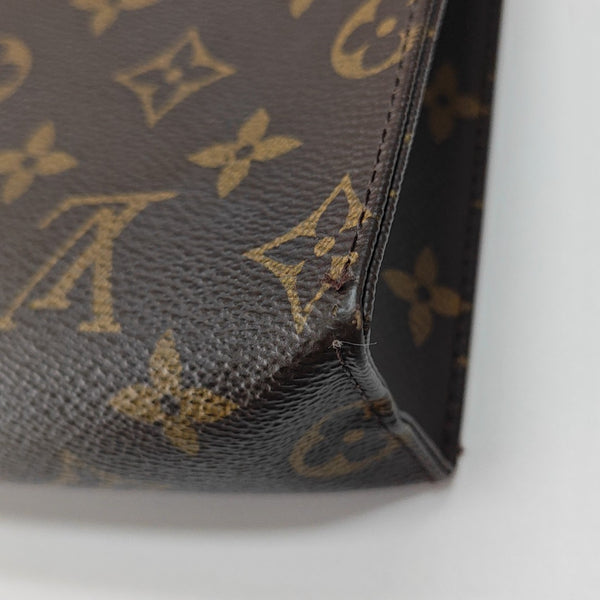 TOILET POCKET 26 Monogram Coated Canvas Brown