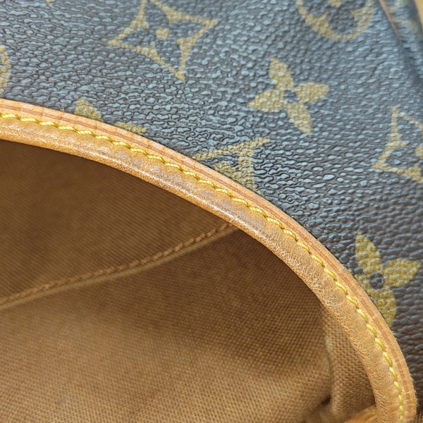 SAUMUR Monogram Coated Canvas Brown