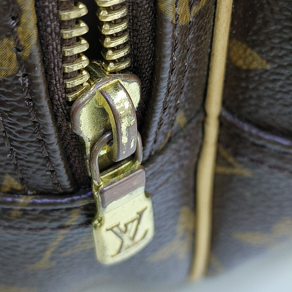 REPORTER PM Monogram Coated Canvas Brown