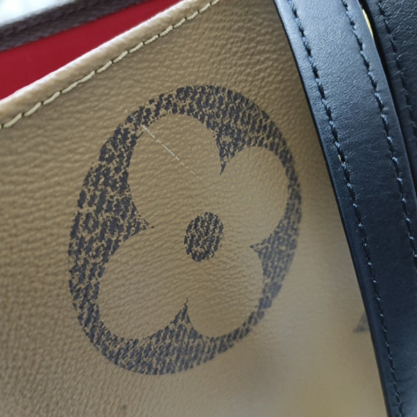 ONTHEGO GM Monogram Coated Canvas Brown