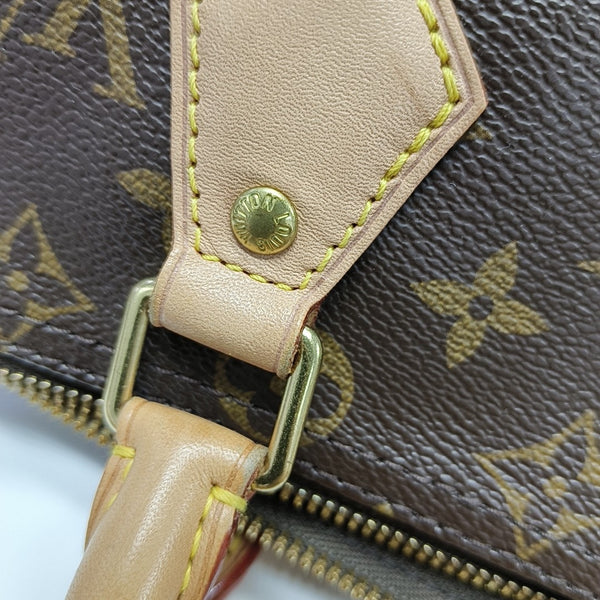 SPEEDY 25 Monogram Coated Canvas Brown