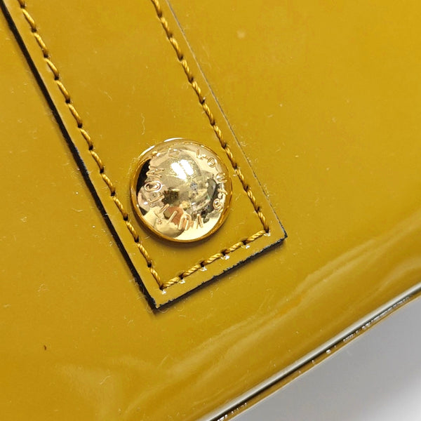 Authenticated pre-owned ALMA PM Patent Leather Yellow - Top Handle Bag at Looply