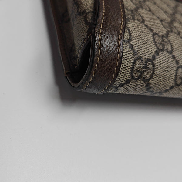 Monogram Coated Canvas Clutch Beige