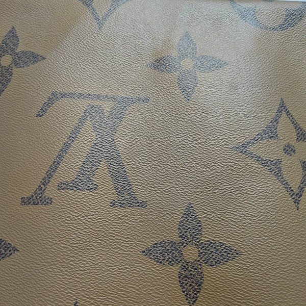 ONTHEGO GM Monogram Coated Canvas Brown