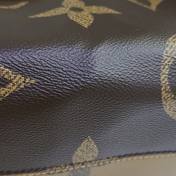 ONTHEGO MM Monogram Coated Canvas Brown