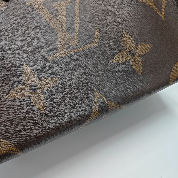 ONTHEGO MM Monogram Coated Canvas Brown