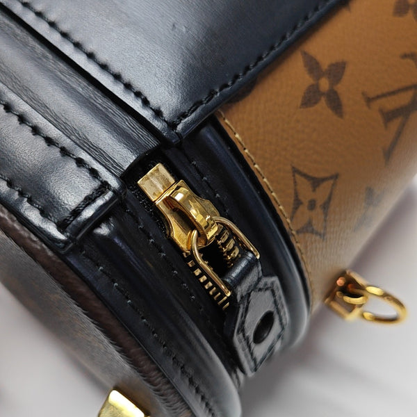 CANNES PM Monogram Coated Canvas Brown