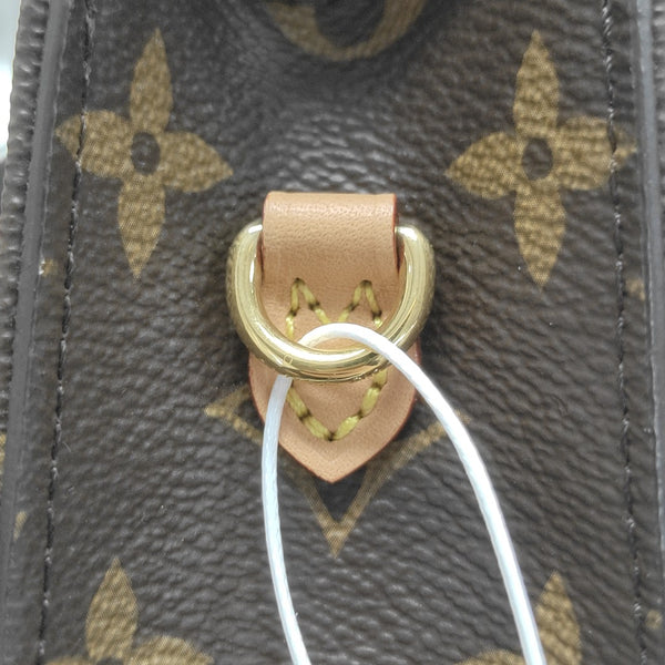 Lily Monogram Coated Canvas Brown