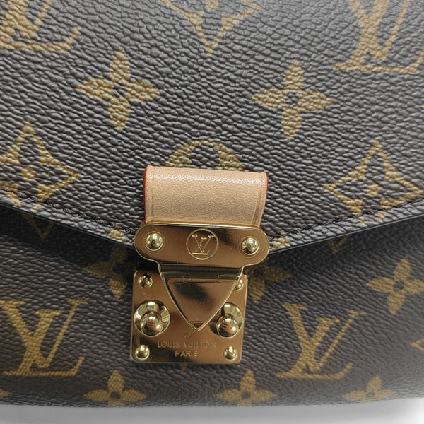 MÉTIS EAST WEST Monogram Coated Canvas Brown