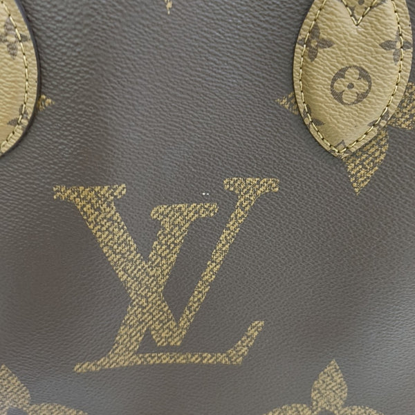 ONTHEGO MM Monogram Coated Canvas Brown