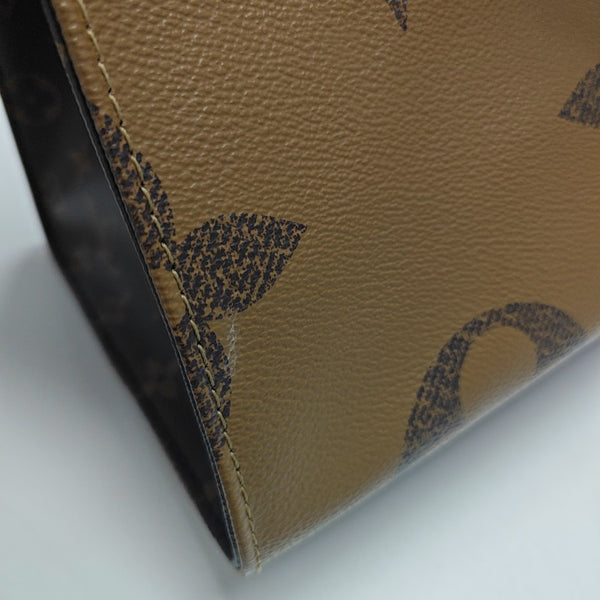 ONTHEGO GM Monogram Coated Canvas Brown