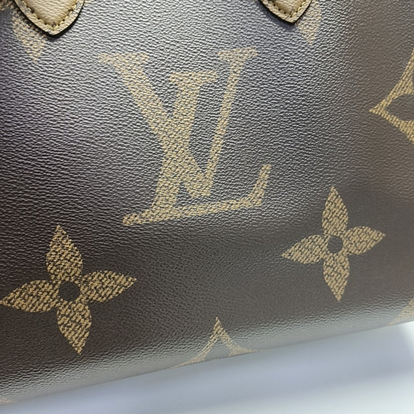 ONTHEGO MM Monogram Coated Canvas Brown