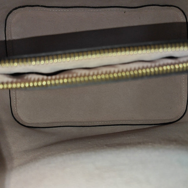 NÉONOÉ MM Monogram Coated Canvas Brown