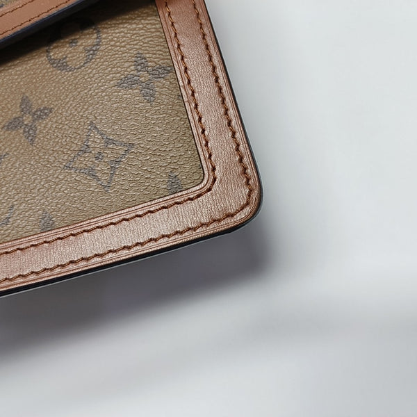 DAUPHINE MM Monogram Coated Canvas Brown