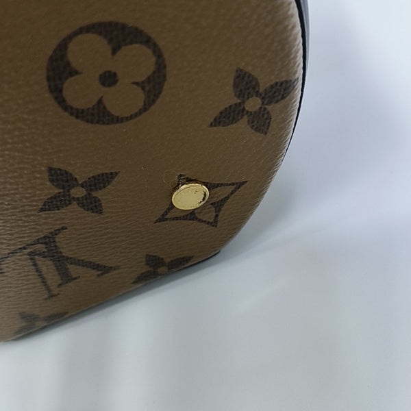 CANNES PM Monogram Coated Canvas Brown