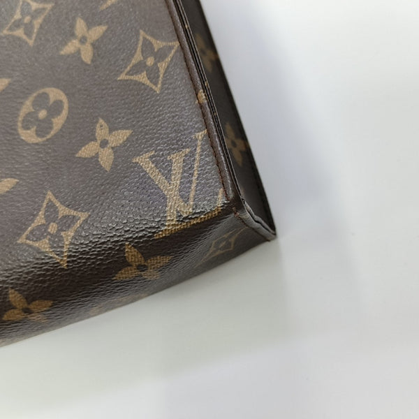 TOILET POCKET 19 Monogram Coated Canvas Brown
