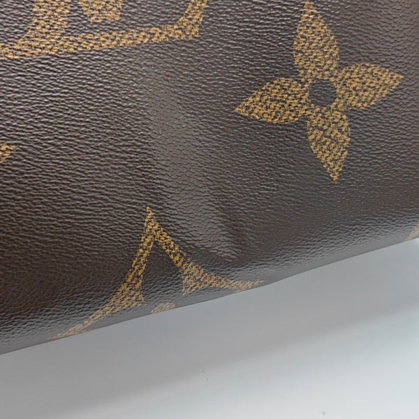 ONTHEGO MM Monogram Coated Canvas Brown