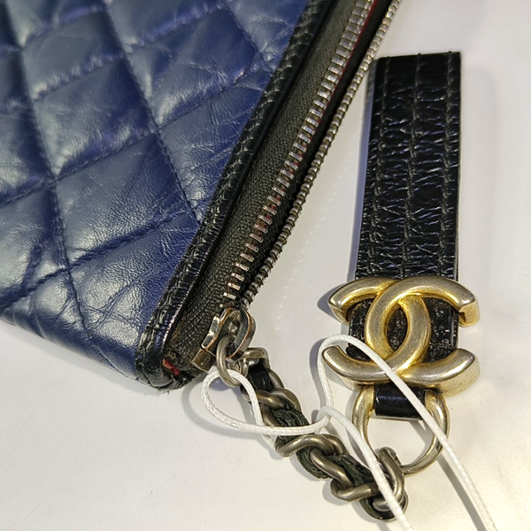 Authenticated pre-owned GABRIELLE Quilted Calfskin Blue - Clutch at Looply