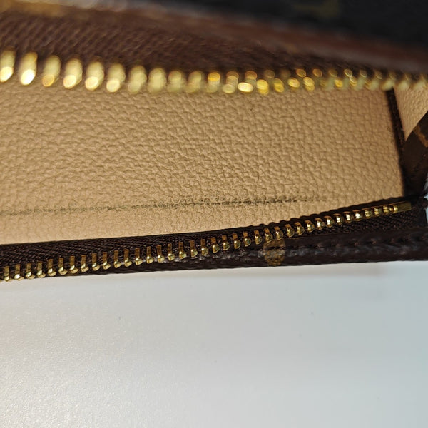 TOILET POCKET 19 Monogram Coated Canvas Brown