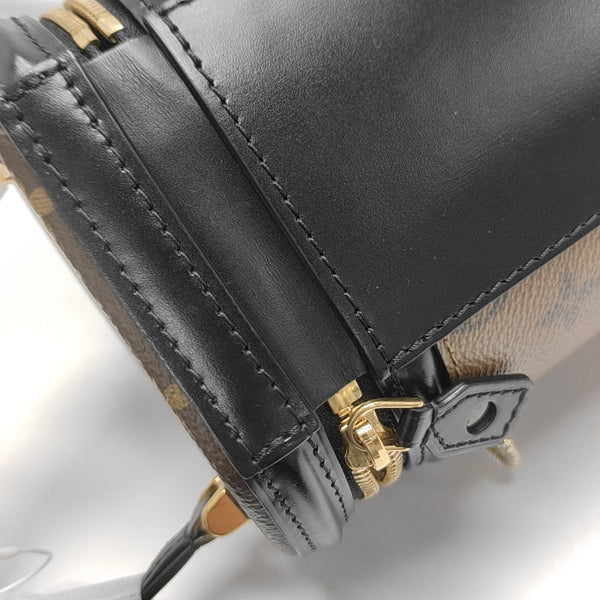CANNES PM Monogram Coated Canvas Brown