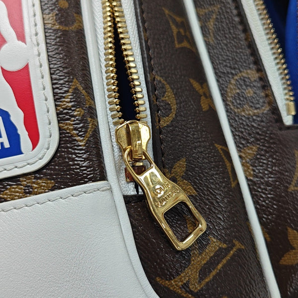 Monogram Coated Canvas Backpack Brown