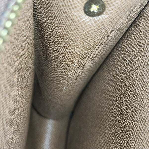 Monogram Coated Canvas Clutch Brown