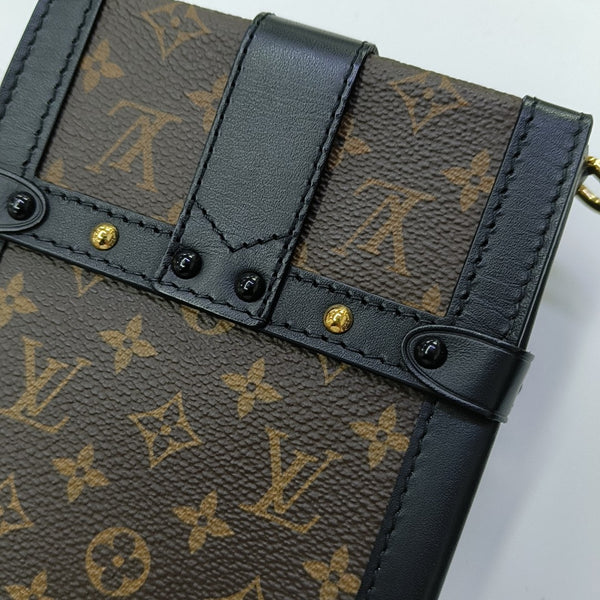 TRUNK Monogram Coated Canvas Brown