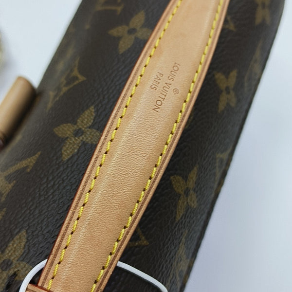 MÉTIS EAST WEST Monogram Coated Canvas Brown