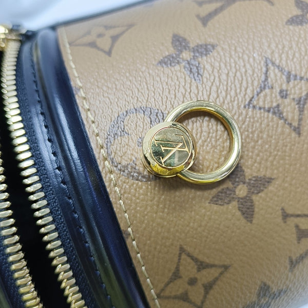 CANNES PM Monogram Coated Canvas Brown