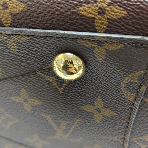 MONTAIGNE GM Monogram Coated Canvas Brown