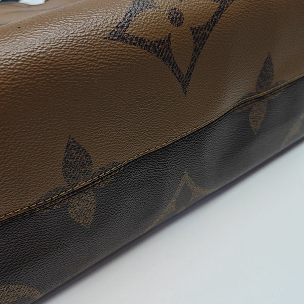ONTHEGO MM Monogram Coated Canvas Brown