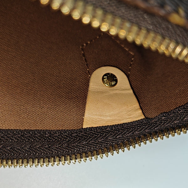 SPEEDY 25 Monogram Coated Canvas Brown