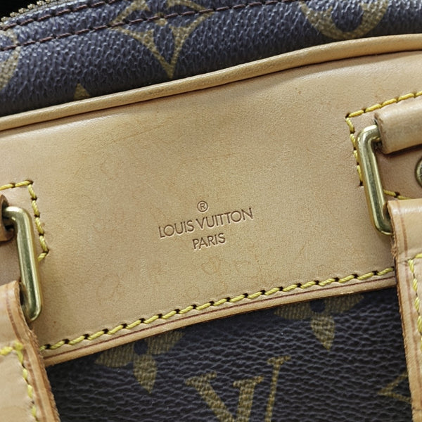 EXCURSION Monogram Coated Canvas Brown