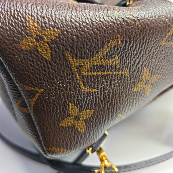 PALM SPRINGS Mini Monogram Coated Canvas Brown