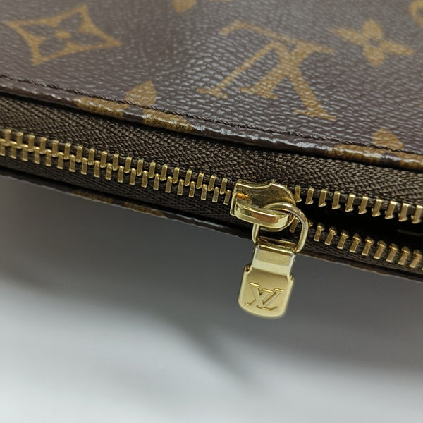 POCHETTE ACCESSOIRES GM Monogram Coated Canvas Brown