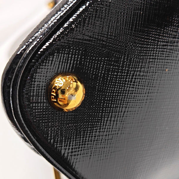 Authenticated pre-owned Promenade Saffiano Calfskin Black - Top Handle Bag at Looply