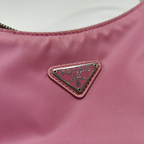 Authenticated pre-owned Re-Edition2005 Mini Nylon Pink - Top Handle Bag at Looply