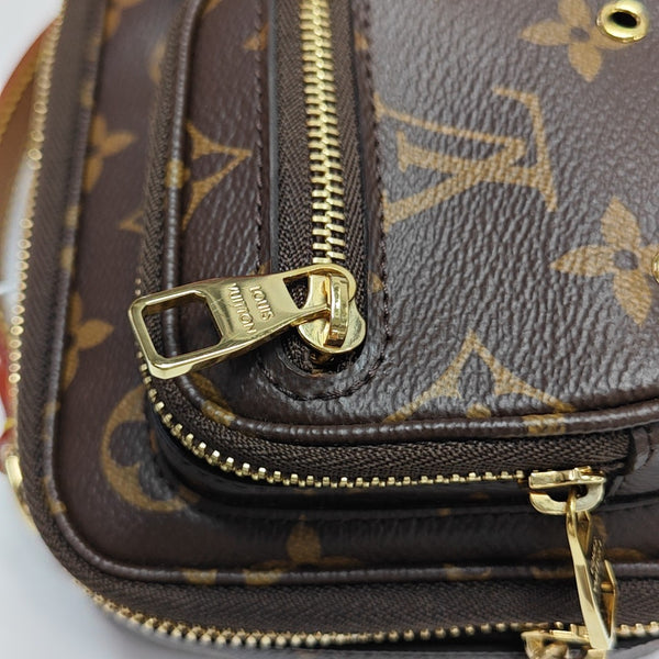 UTILITY Monogram Coated Canvas Brown