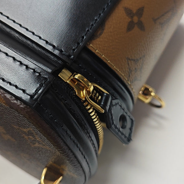 CANNES PM Monogram Coated Canvas Brown
